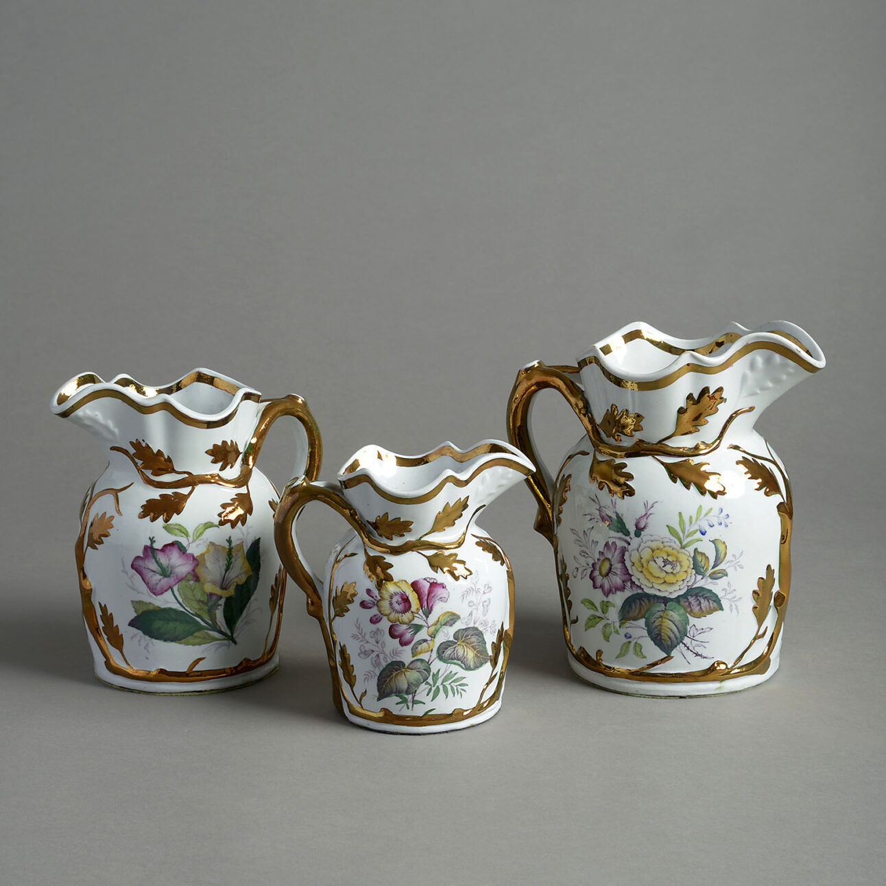 Set of three lustre jugs