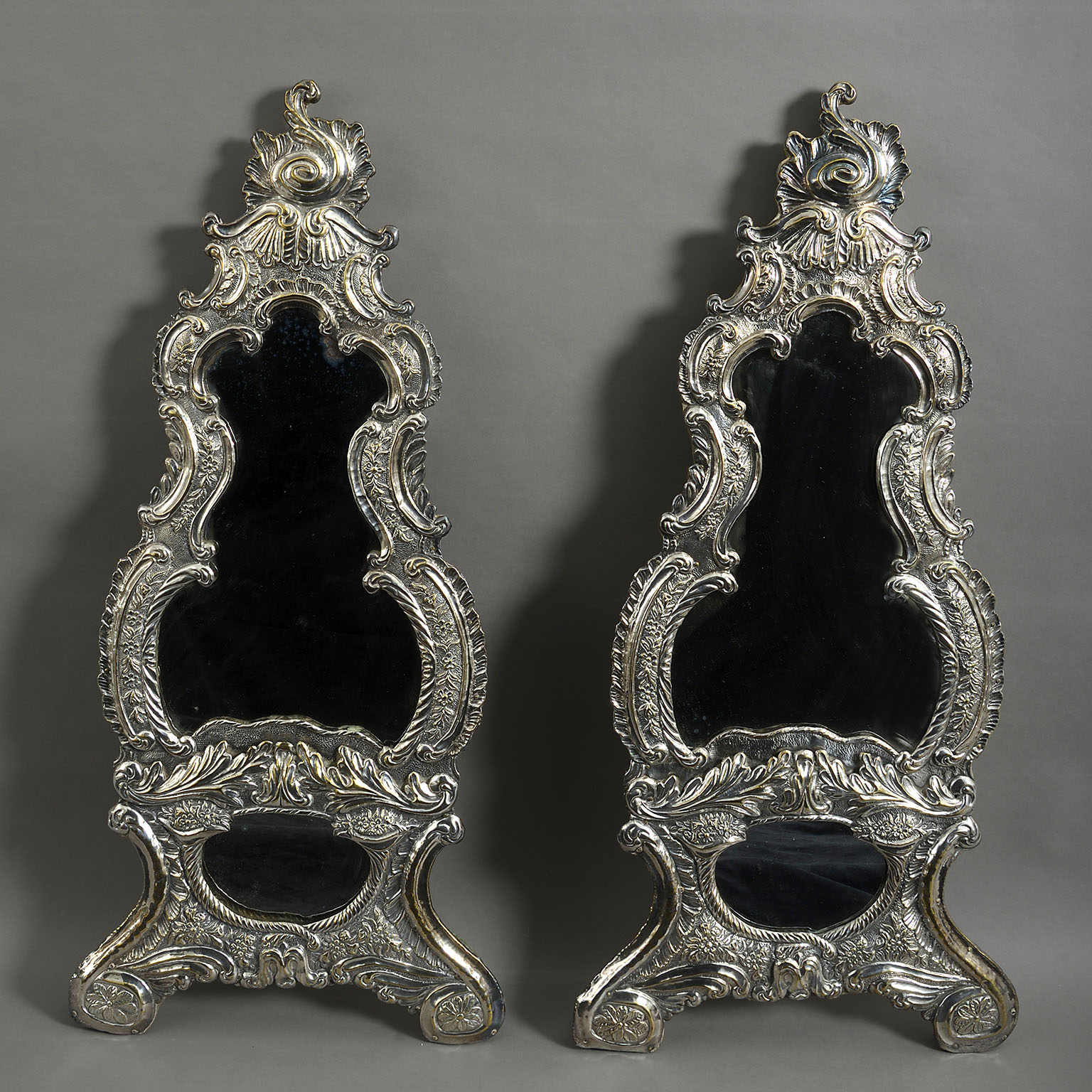 pair of Iberian silver plated mirrors pair of Iberian silver plated mirrors
