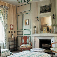 cushion garden seat shown in the guest bedroom at Madeleine Castaing's home, Maison de Leves