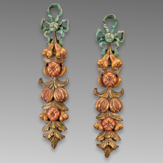 Pair of Carved and Painted Wall Appliques